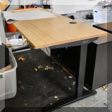 F37. Uplift adjustable standing desk. 